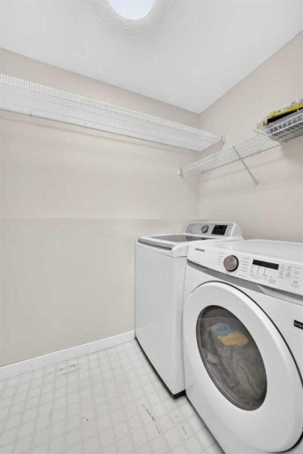 151 Applestone Park Se, Calgary, AB - Indoor Photo Showing Laundry Room