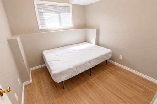 101,102,103,104-10113 106 Avenue, Grande Prairie, AB - Indoor Photo Showing Bedroom
