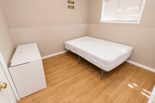 101,102,103,104-10113 106 Avenue, Grande Prairie, AB - Indoor Photo Showing Bedroom