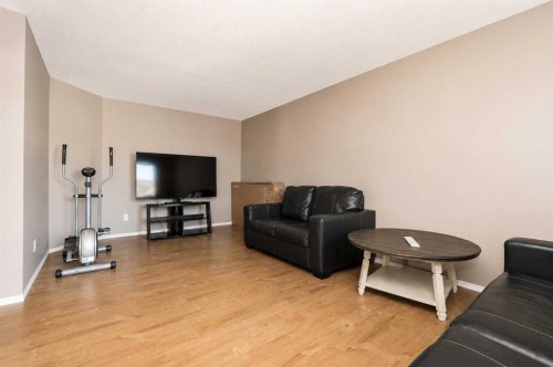 101,102,103,104-10113 106 Avenue, Grande Prairie, AB - Indoor Photo Showing Living Room