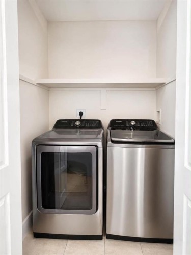 9337 Berge Drive, Grande Cache, AB - Indoor Photo Showing Laundry Room