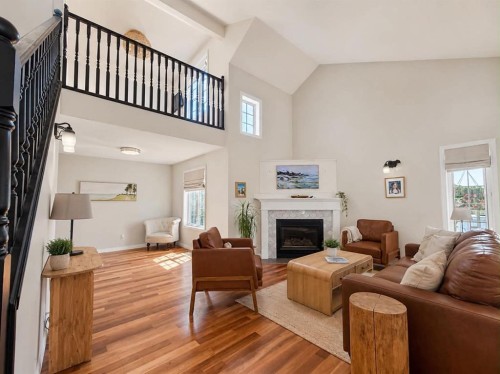 9337 Berge Drive, Grande Cache, AB - Indoor Photo Showing Living Room With Fireplace