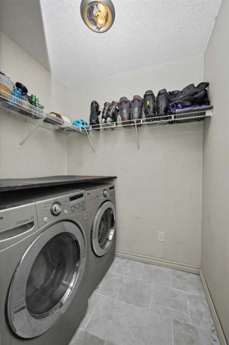 8 Pinnacle Way, Grande Prairie, AB - Indoor Photo Showing Laundry Room