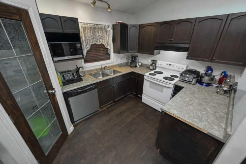 8 Pinnacle Way, Grande Prairie, AB - Indoor Photo Showing Kitchen With Double Sink