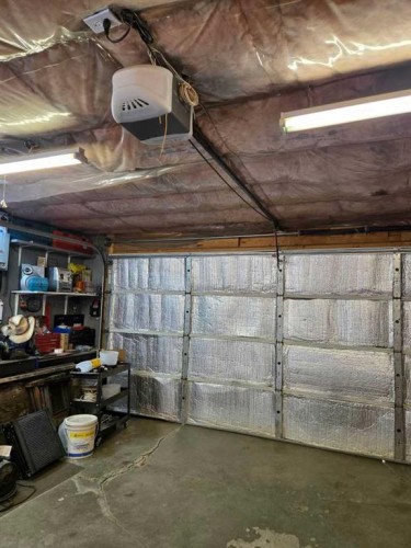 21 Pan Am Street, Swan Hills, AB - Indoor Photo Showing Garage