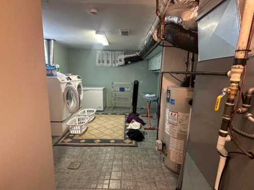 11301 104 Street, Grande Prairie, AB - Indoor Photo Showing Laundry Room