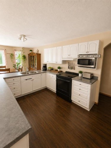 74001-740 Township, High Prairie, AB - Indoor Photo Showing Kitchen With Double Sink