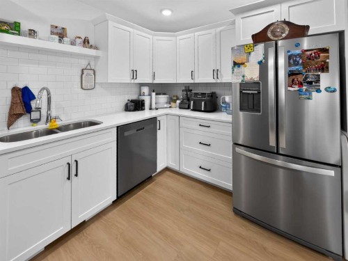 1, 2-10225 105 Ave, La Crete, AB - Indoor Photo Showing Kitchen With Double Sink