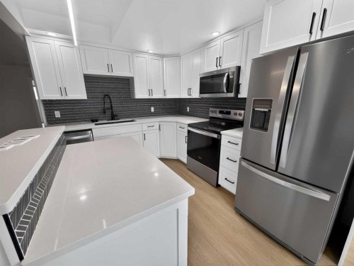 1, 2-10225 105 Ave, La Crete, AB - Indoor Photo Showing Kitchen With Upgraded Kitchen