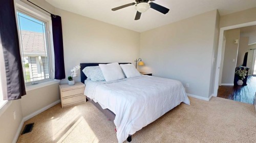 9305 91 Street, Grande Prairie, AB - Indoor Photo Showing Bedroom