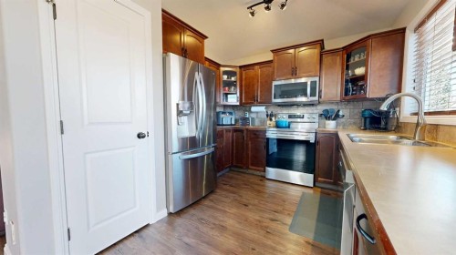9305 91 Street, Grande Prairie, AB - Indoor Photo Showing Kitchen With Stainless Steel Kitchen With Double Sink