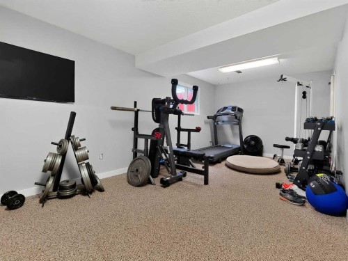 727 Oak Drive, Beaverlodge, AB - Indoor Photo Showing Gym Room