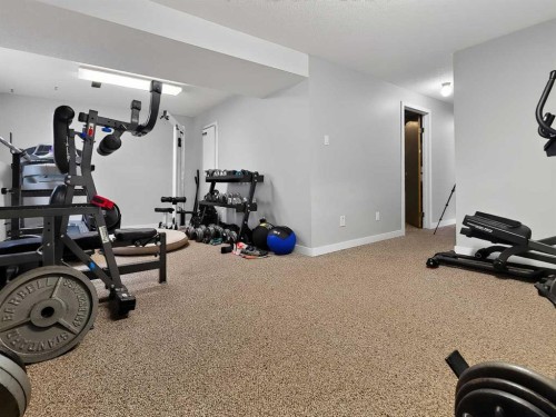 727 Oak Drive, Beaverlodge, AB - Indoor Photo Showing Gym Room