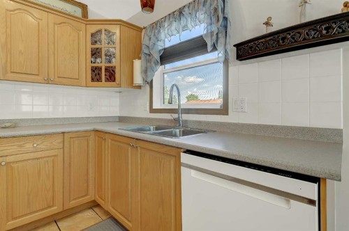 7317 104 Street, Grande Prairie, AB - Indoor Photo Showing Kitchen With Double Sink