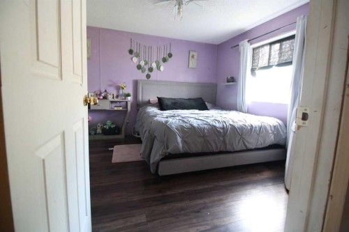 9 Deerridge Drive, High Level, AB - Indoor Photo Showing Bedroom