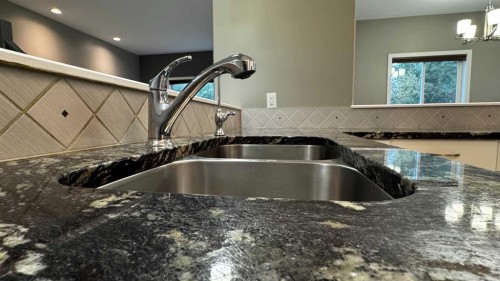 8105 112 Street, Grande Prairie, AB - Indoor Photo Showing Kitchen With Double Sink