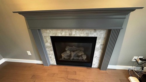 8105 112 Street, Grande Prairie, AB - Indoor Photo Showing Living Room With Fireplace