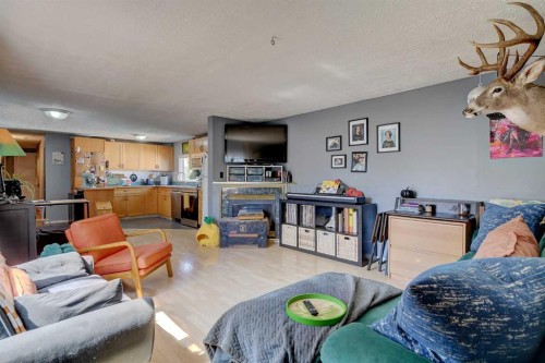 12038 97 Street, Grande Prairie, AB - Indoor Photo Showing Living Room With Fireplace