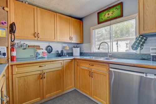 12038 97 Street, Grande Prairie, AB - Indoor Photo Showing Kitchen With Double Sink