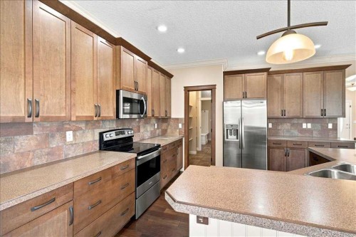 9335 Lakeshore Court, Grande Prairie, AB - Indoor Photo Showing Kitchen With Stainless Steel Kitchen With Double Sink With Upgraded Kitchen