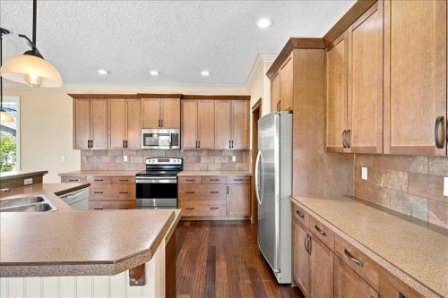 9335 Lakeshore Court, Grande Prairie, AB - Indoor Photo Showing Kitchen With Stainless Steel Kitchen With Double Sink