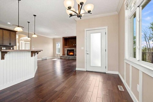 9335 Lakeshore Court, Grande Prairie, AB - Indoor Photo Showing Kitchen With Fireplace