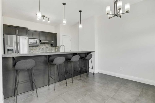 8006 112A Street, Grande Prairie, AB - Indoor Photo Showing Kitchen With Upgraded Kitchen