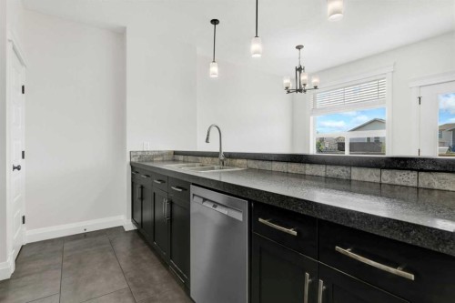 8006 112A Street, Grande Prairie, AB - Indoor Photo Showing Kitchen With Double Sink