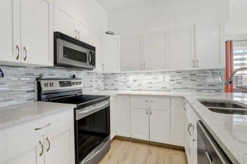 404-12320 102 Street, Grande Prairie, AB - Indoor Photo Showing Kitchen With Double Sink With Upgraded Kitchen