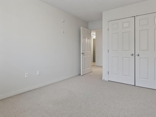 302-9810 96 Street, Grande Prairie, AB - Indoor Photo Showing Other Room