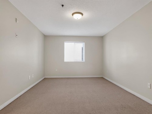 302-9810 96 Street, Grande Prairie, AB - Indoor Photo Showing Other Room