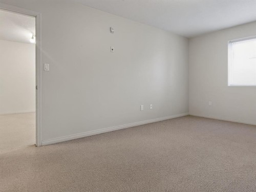 302-9810 96 Street, Grande Prairie, AB - Indoor Photo Showing Other Room
