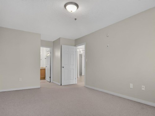 302-9810 96 Street, Grande Prairie, AB - Indoor Photo Showing Other Room