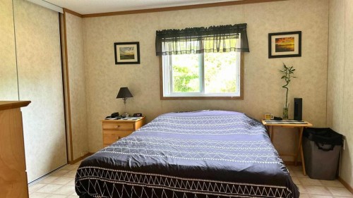 783026 2 Highway, Rycroft, AB - Indoor Photo Showing Bedroom