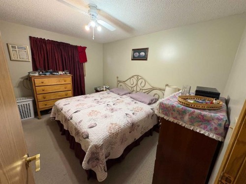 10313 89 Street, Peace River, AB - Indoor Photo Showing Bedroom