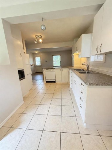 4653 55Th Avenue, High Prairie, AB - Indoor Photo Showing Kitchen With Double Sink