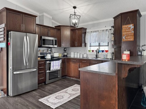 248 Mawdsley Crescent, Grande Cache, AB - Indoor Photo Showing Kitchen With Stainless Steel Kitchen With Double Sink
