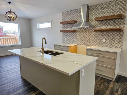 9215 94A Avenue, Wembley, AB - Indoor Photo Showing Kitchen With Double Sink