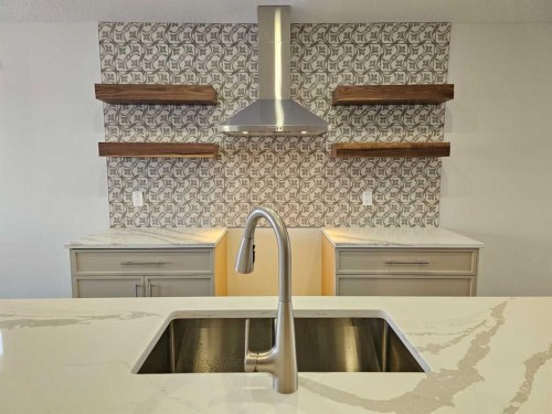 9215 94A Avenue, Wembley, AB - Indoor Photo Showing Kitchen With Double Sink