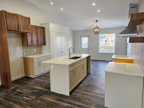 9215 94A Avenue, Wembley, AB - Indoor Photo Showing Kitchen With Double Sink