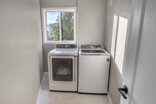 102 Pinnacle Crescent, Grande Prairie, AB - Indoor Photo Showing Laundry Room