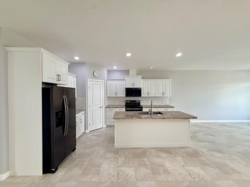 9904 111 Street Unit 4, La Crete, AB - Indoor Photo Showing Kitchen With Double Sink