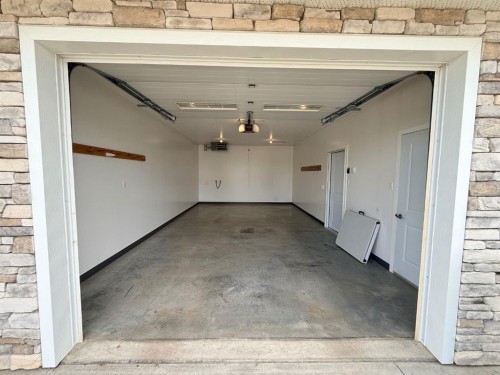 9904 111 Street Unit 4, La Crete, AB - Indoor Photo Showing Garage
