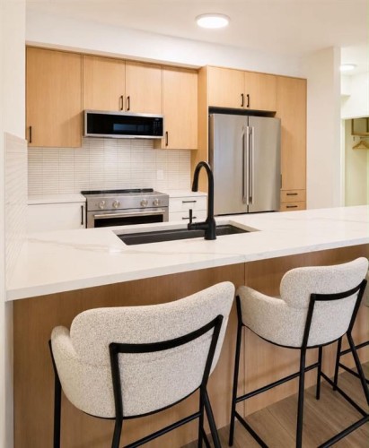 101-160 Moberly Road, Grande Cache, AB - Indoor Photo Showing Kitchen With Double Sink