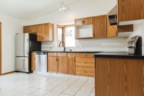 10610 Michaelis Boulevard, Grande Prairie, AB - Indoor Photo Showing Kitchen