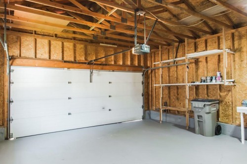 10610 Michaelis Boulevard, Grande Prairie, AB - Indoor Photo Showing Garage