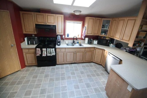 45 Dragonfly Crescent, High Level, AB - Indoor Photo Showing Kitchen With Double Sink
