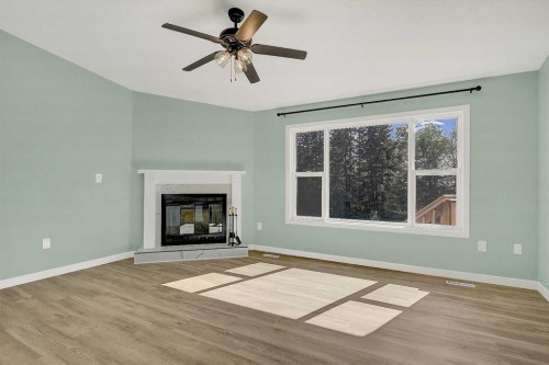723020 Range Road 95, Beaverlodge, AB - Indoor Photo Showing Living Room With Fireplace