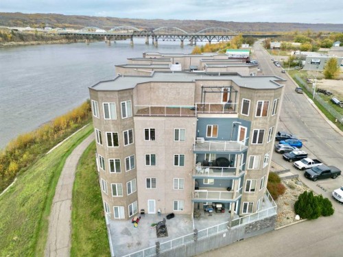 202-9810 94 Street, Peace River, AB - Outdoor With Body Of Water With View