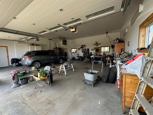 11512 Range Road 63, Rural Cypress County, AB - Indoor Photo Showing Garage